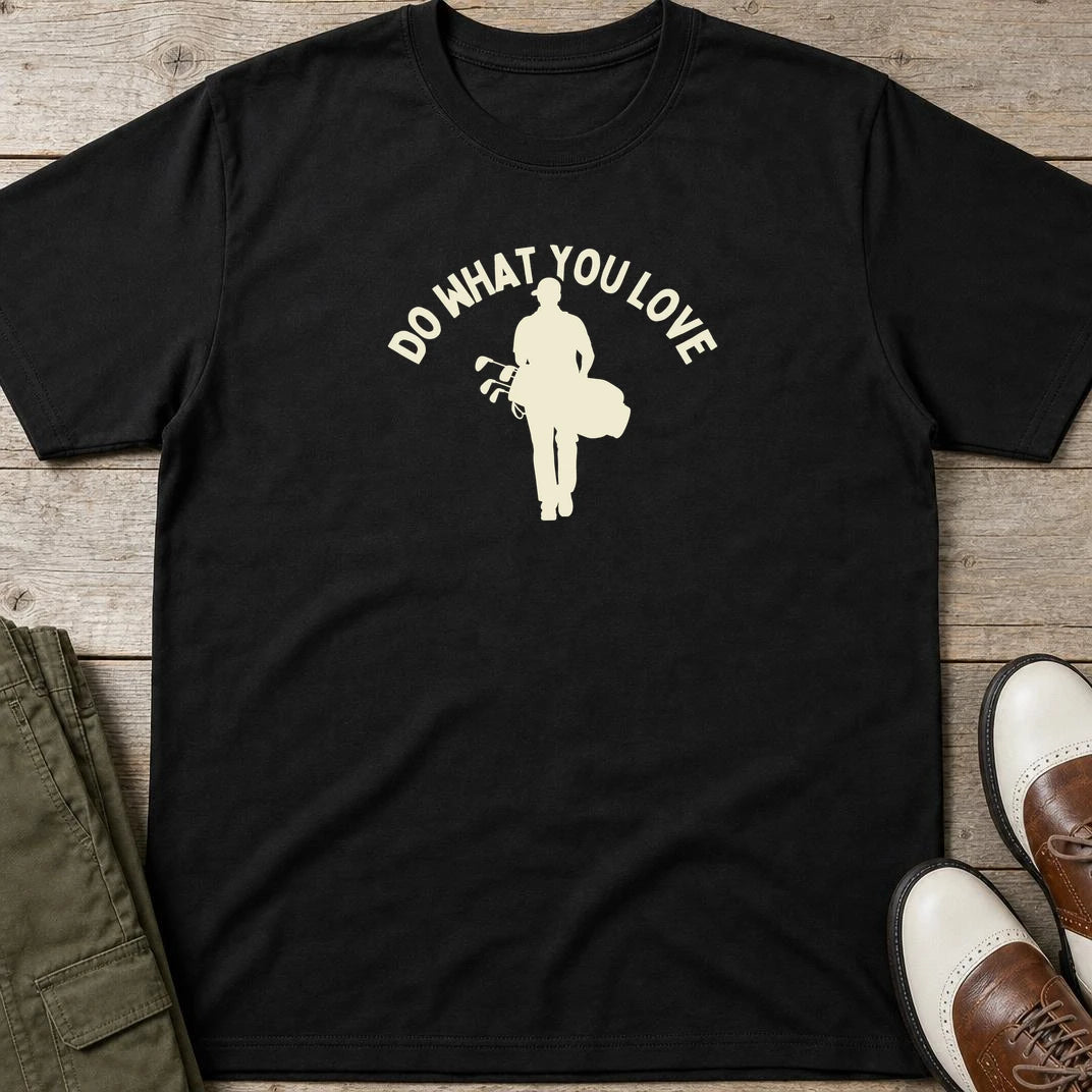 Do What You Love T-Shirt in Black lying on a plain floor. T-shirt is a unisex cut and 100 per cent cotton.