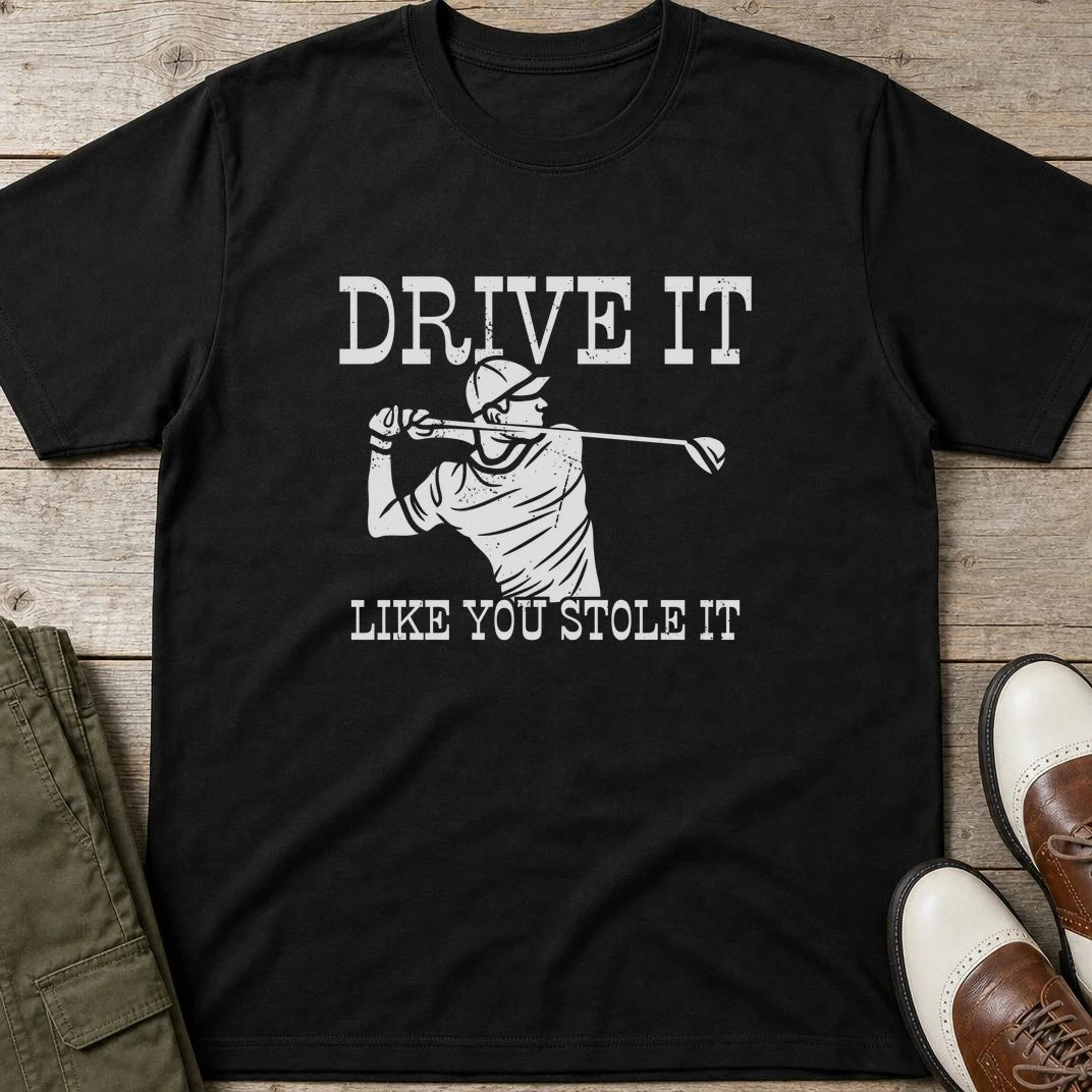 Stole It T-Shirt in Black lying on a plain floor. T-shirt is a unisex cut and 100 per cent cotton.
