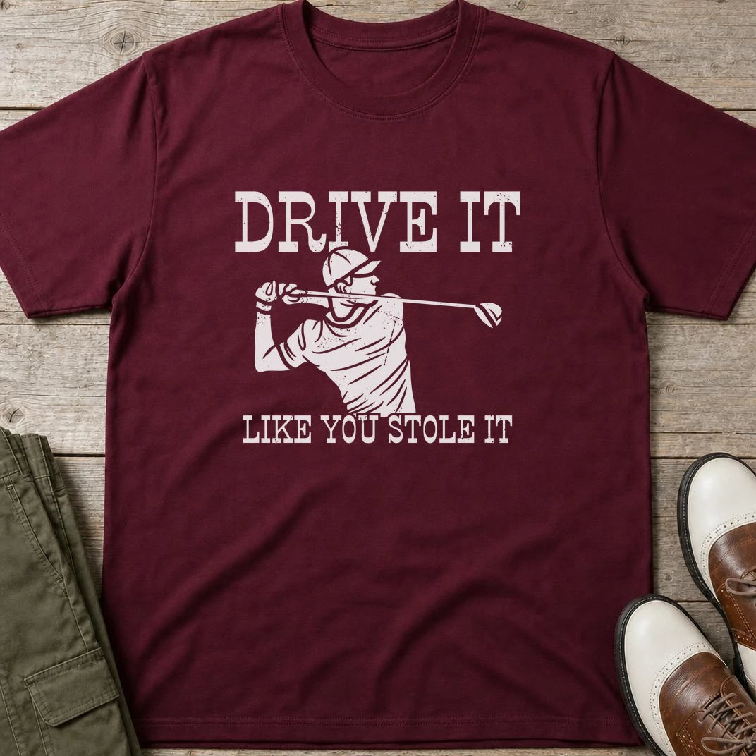 Stole It T-Shirt in Maroon lying on a plain floor. T-shirt is a unisex cut and 100 per cent cotton.