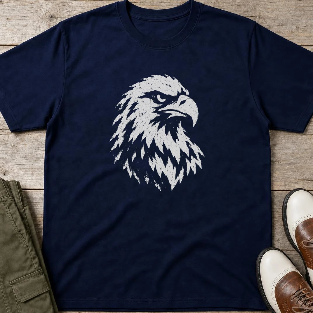 Eagle Graphic T-Shirt in Navy lying on a plain floor. T-shirt is a unisex cut and 100 per cent cotton.