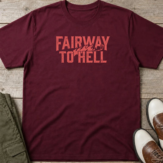 Fairway To Hell II T-Shirt in Maroon lying on a plain floor. T-shirt is a unisex cut and 100 per cent cotton.