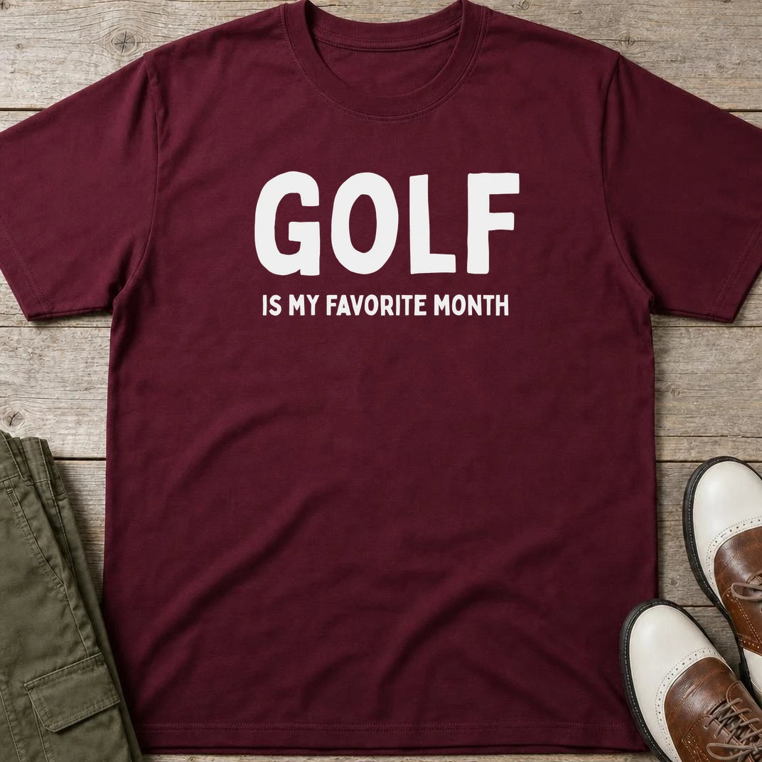 Favorite Month T-Shirt in Maroon lying on a plain floor. T-shirt is a unisex cut and 100 per cent cotton.