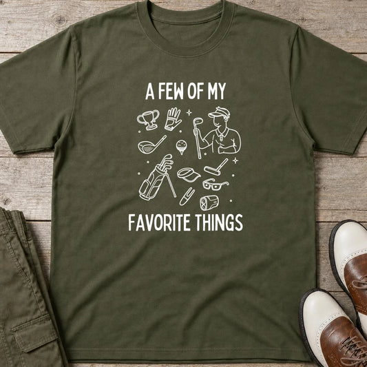 My Favorite Things T-Shirt in Military Green lying on a plain floor. T-shirt is a unisex cut and 100 per cent cotton.