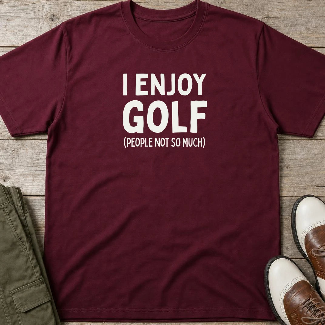 I Enjoy Golf T-Shirt in Maroon lying on a plain floor. T-shirt is a unisex cut and 100 per cent cotton.