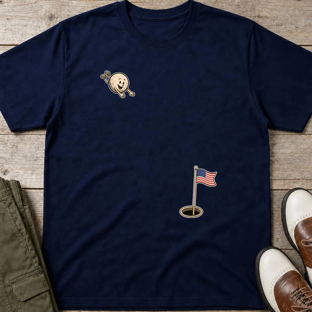 Flying Golf USA T-Shirt in Navy lying on a plain floor. T-shirt is a unisex cut and 100 per cent cotton.