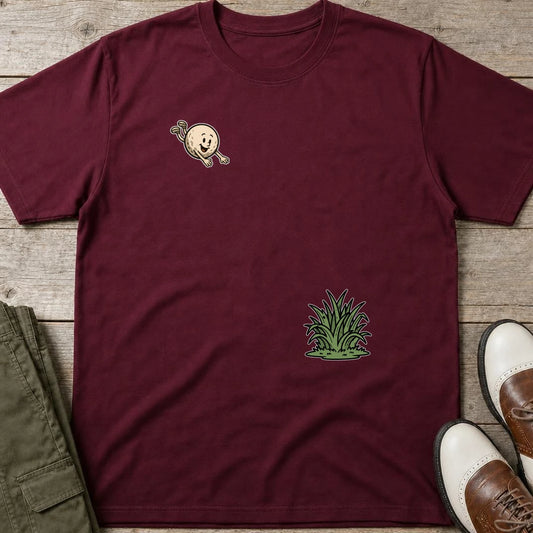 Flying Into Rough T-Shirt in Maroon lying on a plain floor. T-shirt is a unisex cut and 100 per cent cotton.