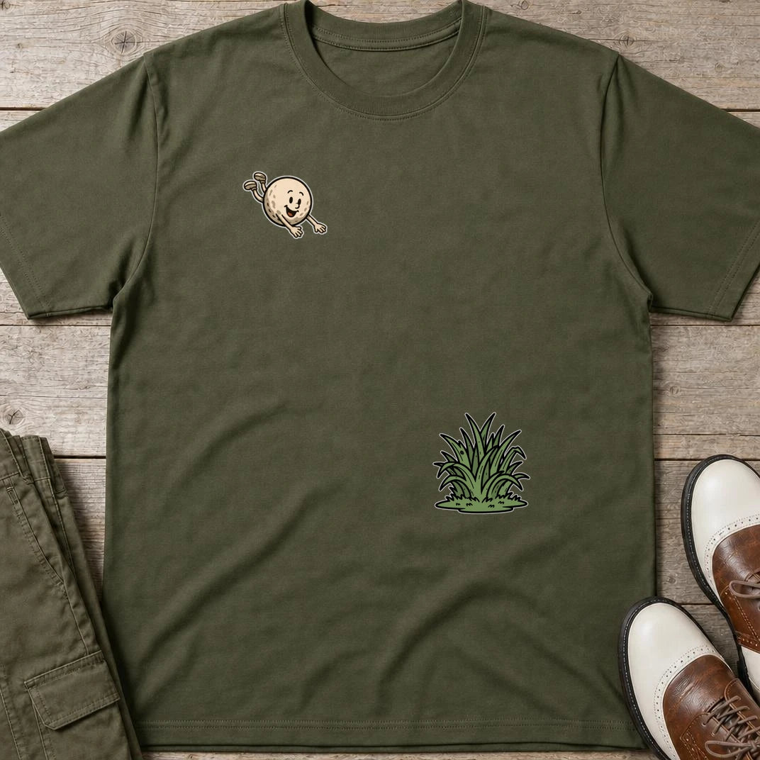 Flying Into Rough T-Shirt in Military Green lying on a plain floor. T-shirt is a unisex cut and 100 per cent cotton.
