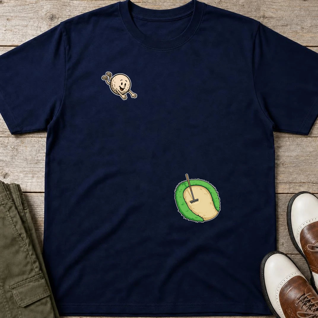 Flying Sand Trap T-Shirt in Navy lying on a plain floor. T-shirt is a unisex cut and 100 per cent cotton.