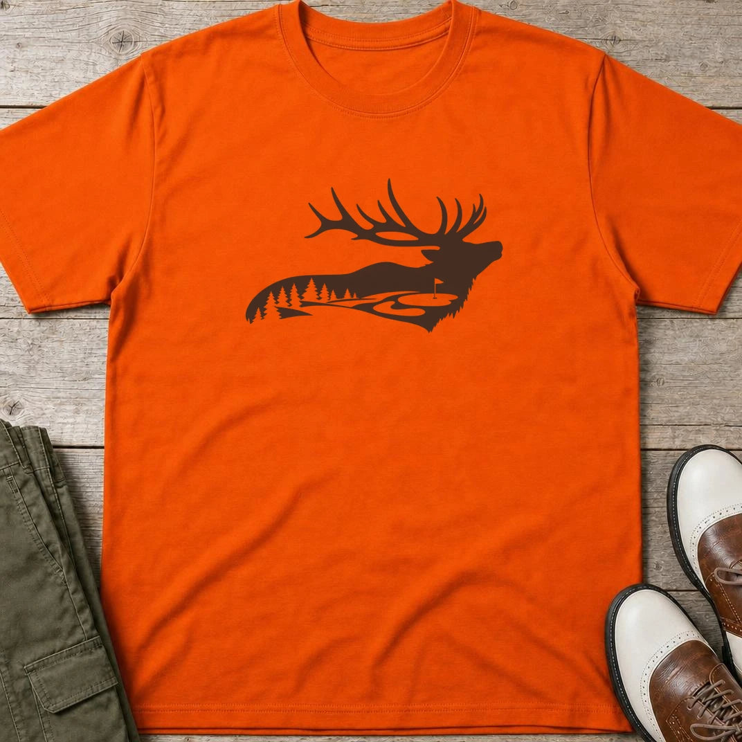 Forest Golf T-Shirt in Orange lying on a plain floor. T-shirt is a unisex cut and 100 per cent cotton.