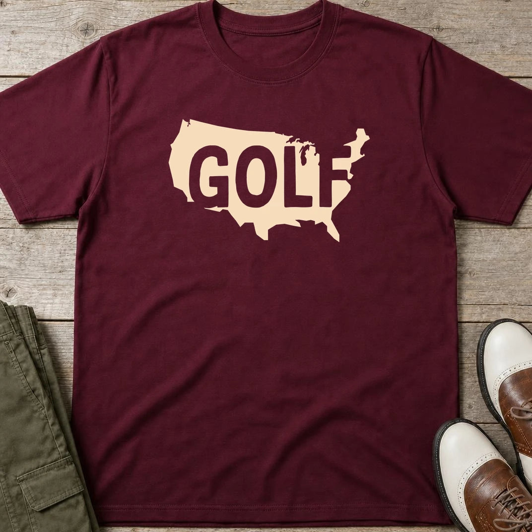 Golf USA T-Shirt in Maroon lying on a plain floor. T-shirt is a unisex cut and 100 per cent cotton.