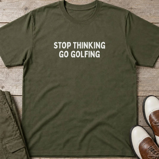 Go Golfing T-Shirt in Military Green lying on a plain floor. T-shirt is a unisex cut and 100 per cent cotton.