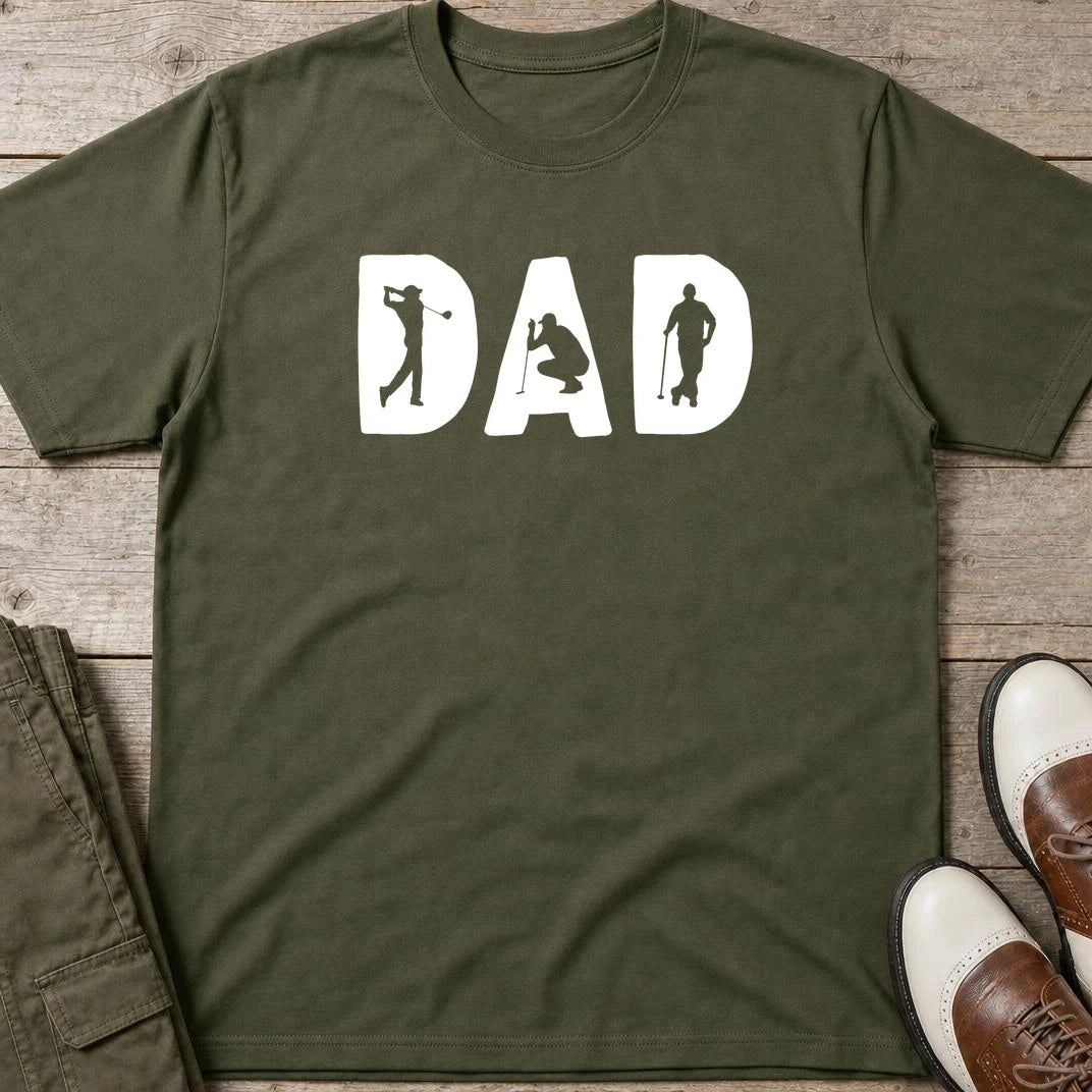 Golf Dad T-Shirt in Military Green lying on a plain floor. T-shirt is a unisex cut and 100 per cent cotton.
