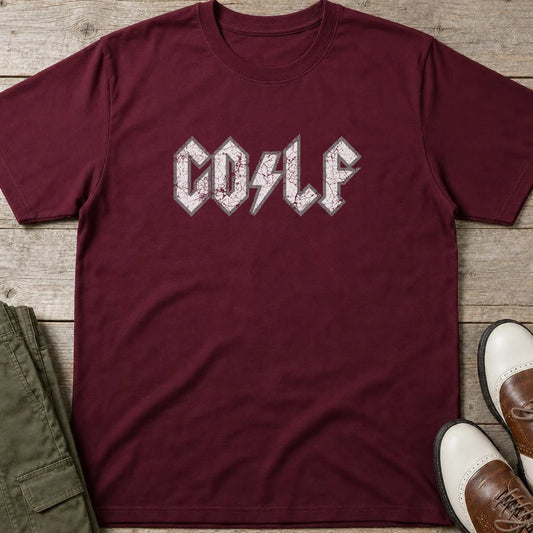 Rock On Golf T-Shirt in Maroon lying on a plain floor. T-shirt is a unisex cut and 100 per cent cotton.