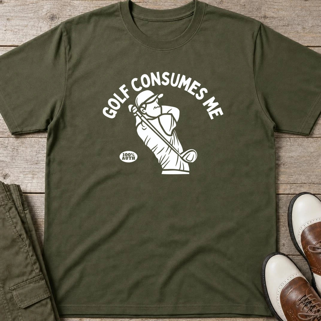 Golf Consumes Me T-Shirt in Military Green lying on a plain floor. T-shirt is a unisex cut and 100 per cent cotton.