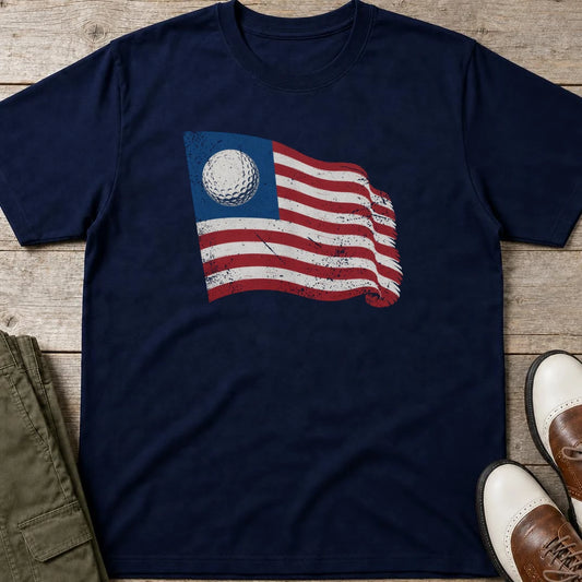 Golf Flag T-Shirt in Navy lying on a plain floor. T-shirt is a unisex cut and 100 per cent cotton.