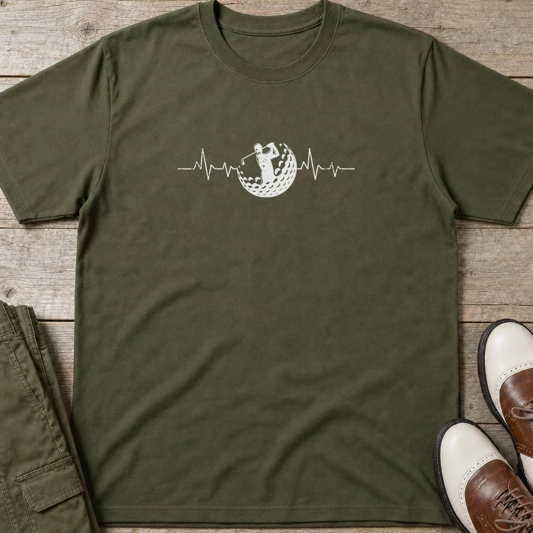 Golf Beat T-Shirt in Military Green lying on a plain floor. T-shirt is a unisex cut and 100 per cent cotton.
