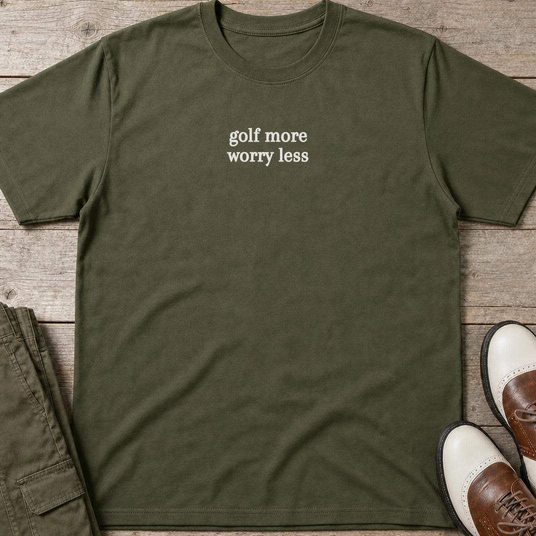 Golf More T-Shirt in Military Green lying on a plain floor. T-shirt is a unisex cut and 100 per cent cotton.