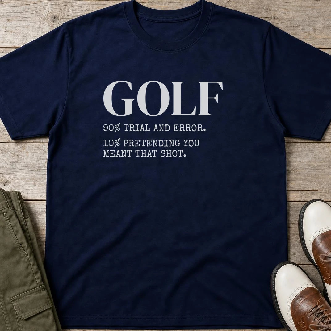 Pretending T-Shirt in Navy lying on a plain floor. T-shirt is a unisex cut and 100 per cent cotton.