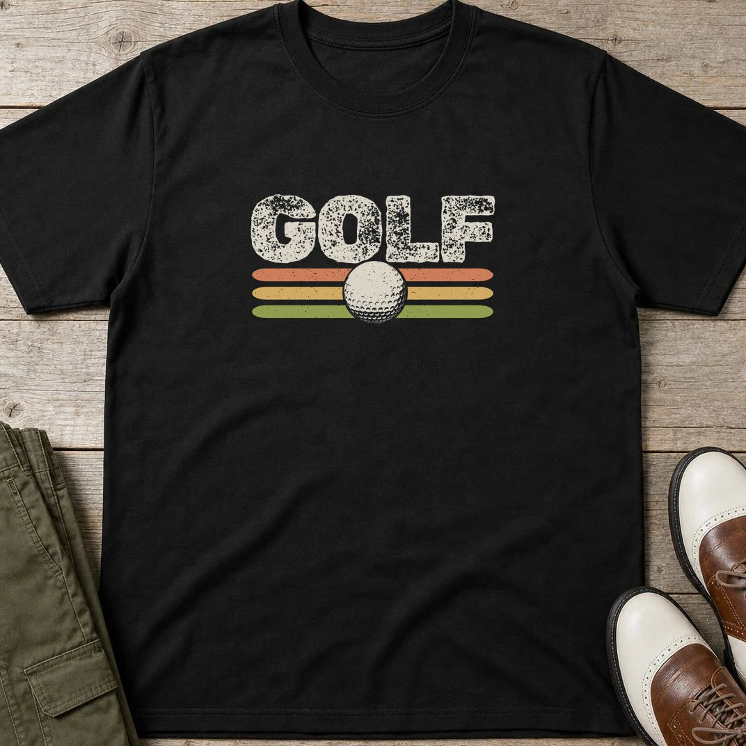 Golf Retro T-Shirt in Black lying on a plain floor. T-shirt is a unisex cut and 100 per cent cotton.