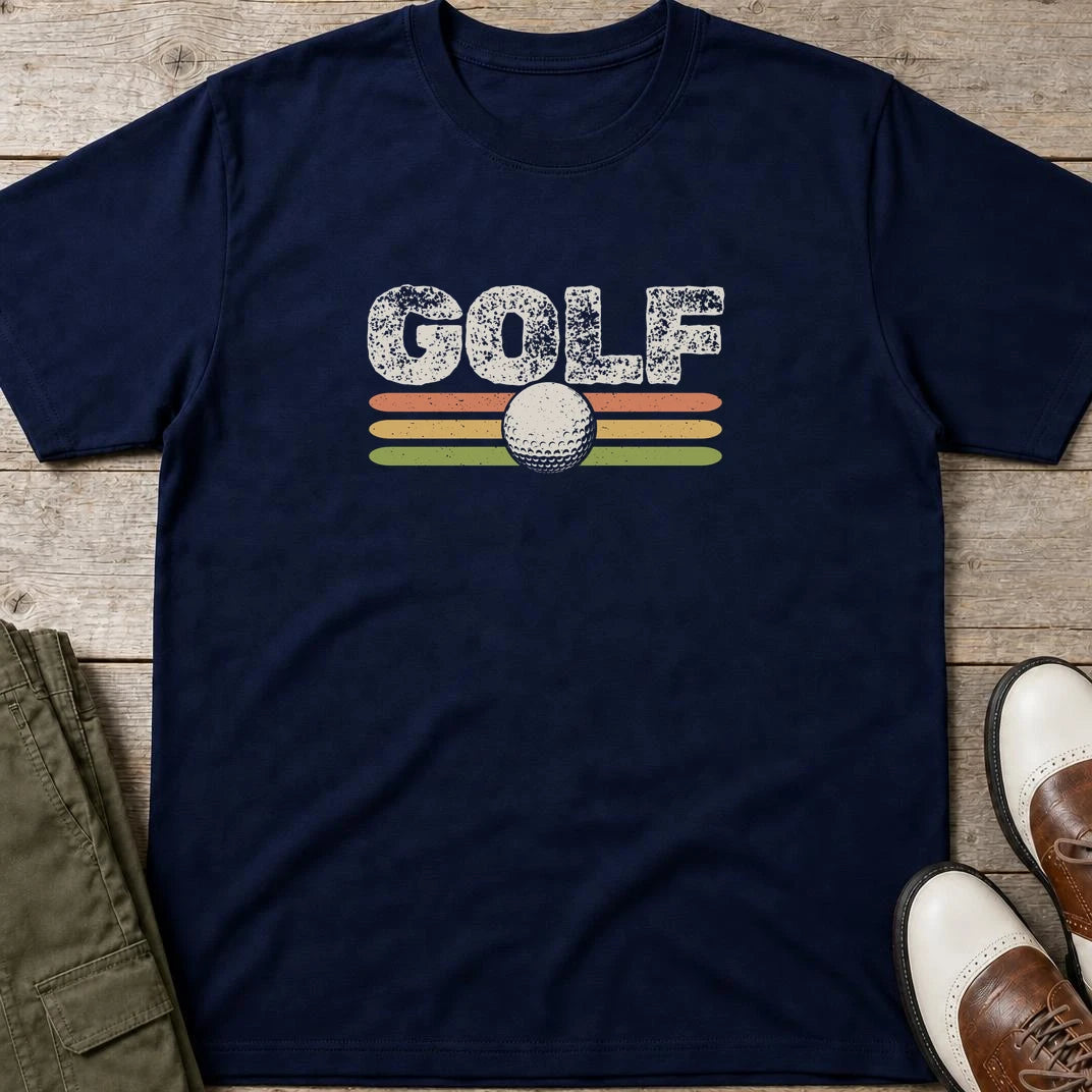 Golf Retro T-Shirt in Navy lying on a plain floor. T-shirt is a unisex cut and 100 per cent cotton.