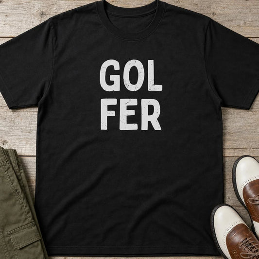 Gol Fer T-Shirt in Black lying on a plain floor. T-shirt is a unisex cut and 100 per cent cotton.