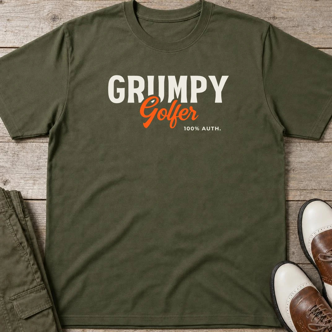 Grumpy Golfer 100% T-Shirt in Military Green lying on a plain floor. T-shirt is a unisex cut and 100 per cent cotton.