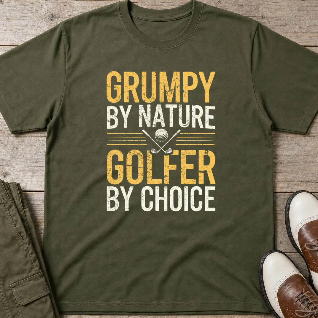 Grumpy By Nature T-Shirt in Military Green lying on a plain floor. T-shirt is a unisex cut and 100 per cent cotton.