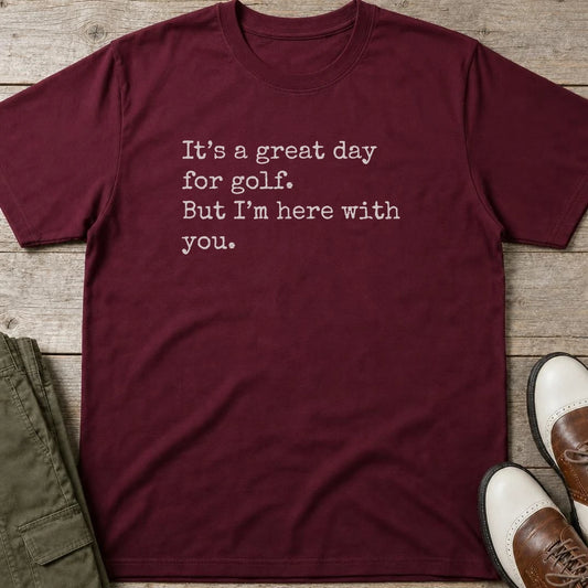 Here With You T-Shirt in Maroon lying on a plain floor. T-shirt is a unisex cut and 100 per cent cotton.