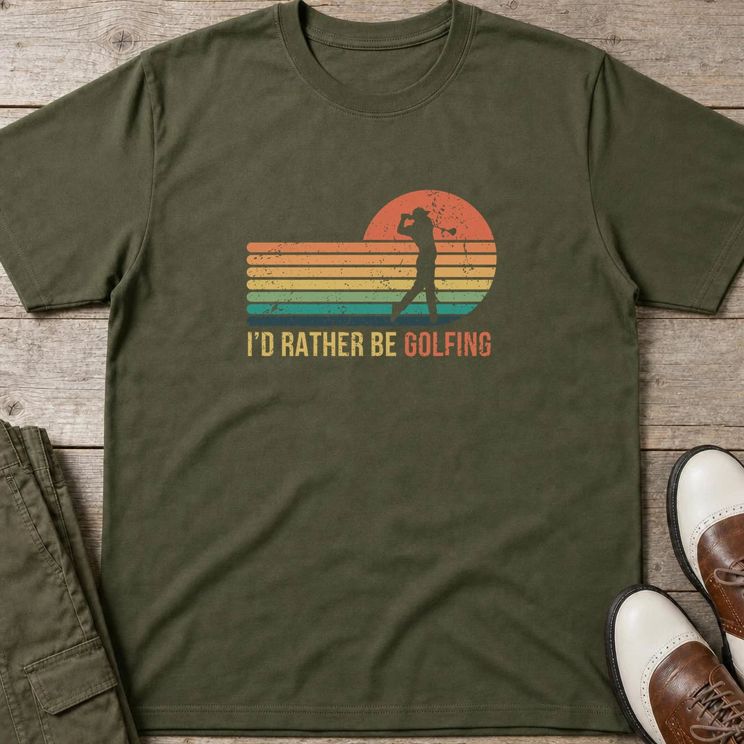 Rather Be Golfing T-Shirt in Military Green lying on a plain floor. T-shirt is a unisex cut and 100 per cent cotton.