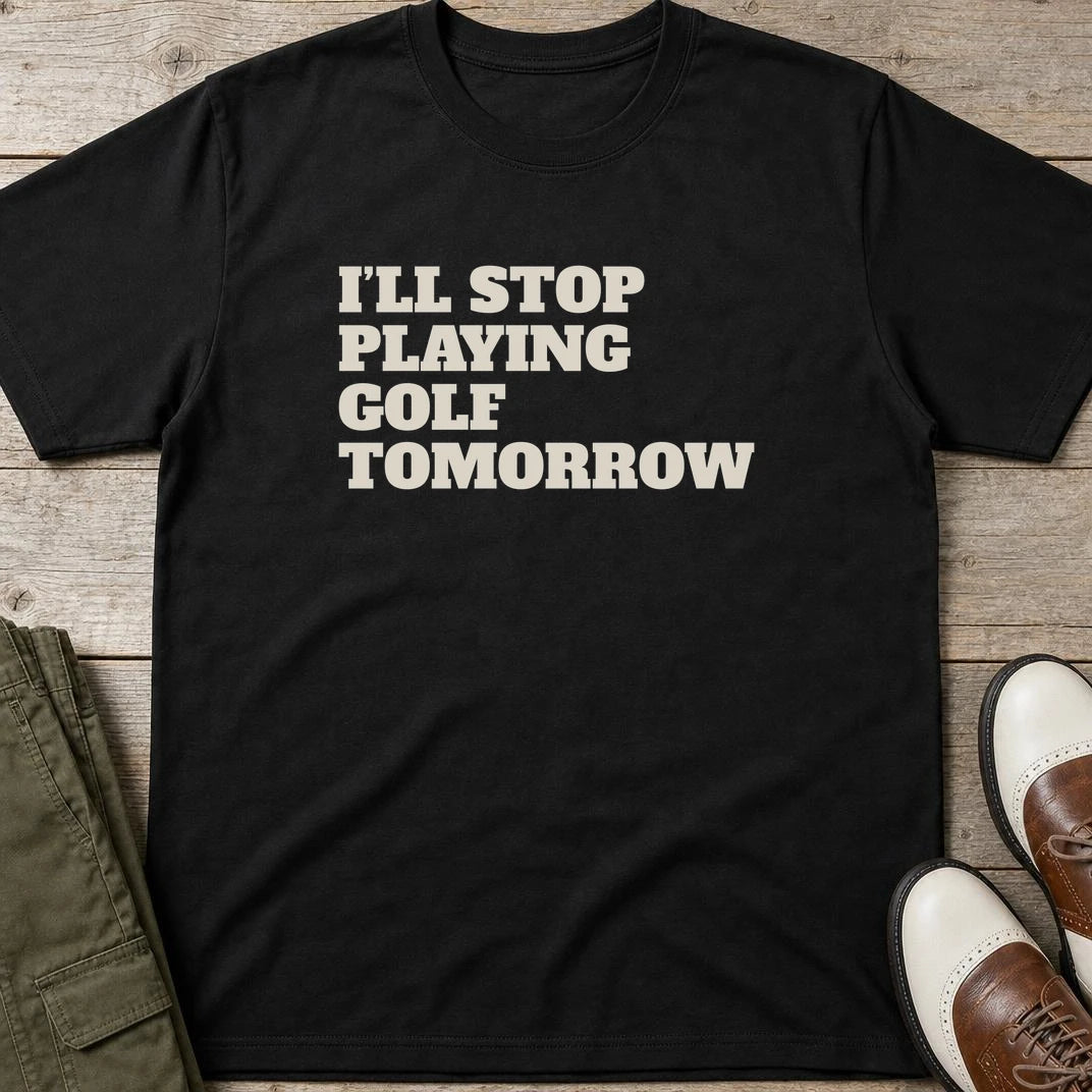 I'll Stop T-Shirt in Black lying on a plain floor. T-shirt is a unisex cut and 100 per cent cotton.