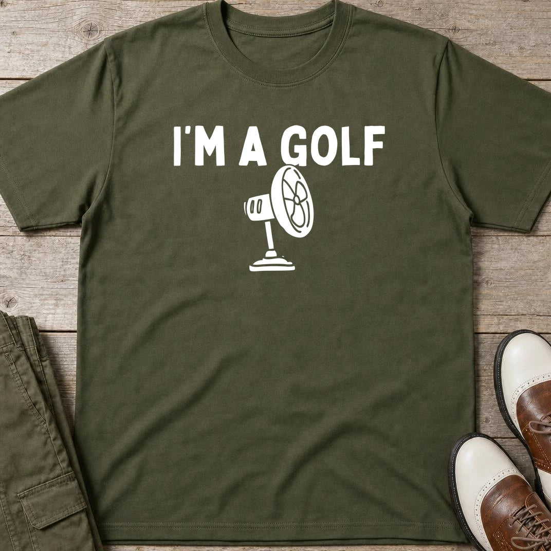 I'm A Golf Fan T-Shirt in Military Green lying on a plain floor. T-shirt is a unisex cut and 100 per cent cotton.