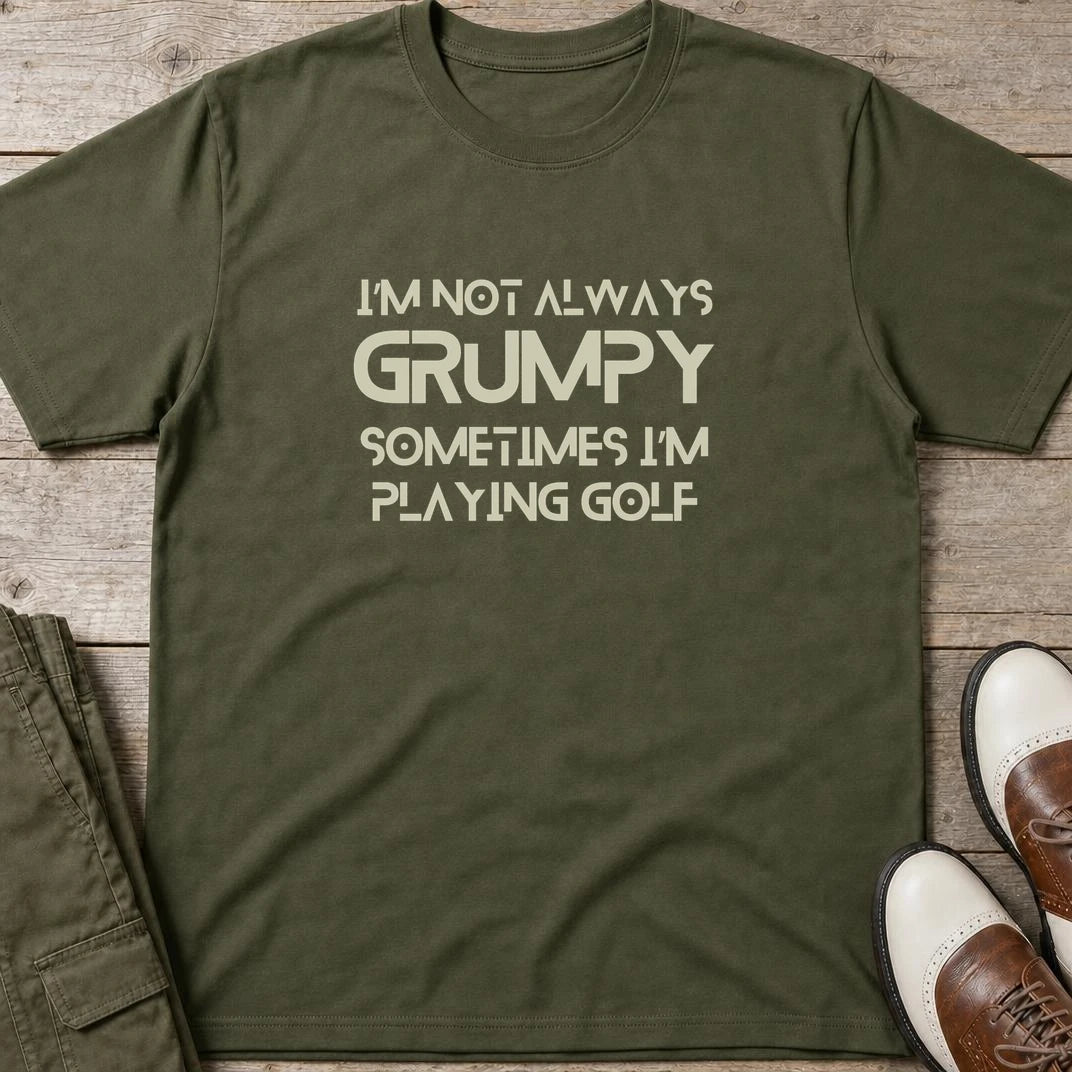 Grumpy Pure (no grunge font) T-Shirt in Military Green lying on a plain floor. T-shirt is a unisex cut and 100 per cent cotton.