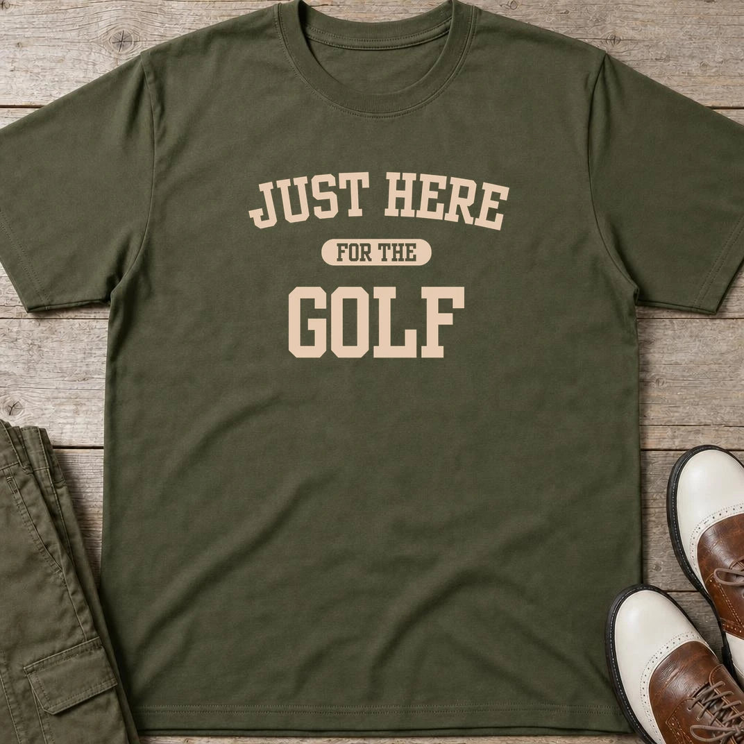 Just Here T-Shirt in Military Green lying on a plain floor. T-shirt is a unisex cut and 100 per cent cotton.