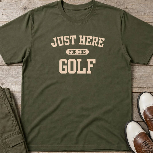 Just Here T-Shirt in Military Green lying on a plain floor. T-shirt is a unisex cut and 100 per cent cotton.
