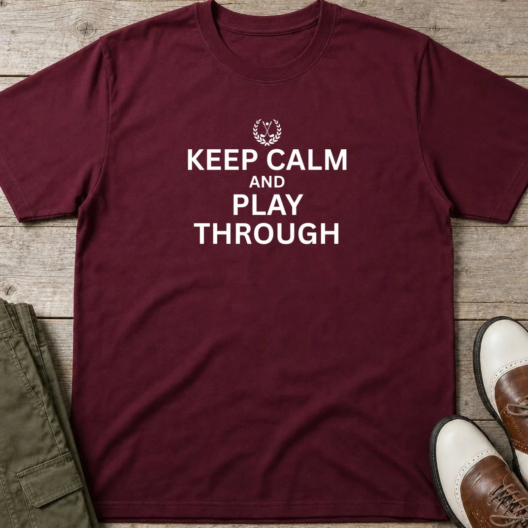 Keep Calm T-Shirt in Maroon lying on a plain floor. T-shirt is a unisex cut and 100 per cent cotton.