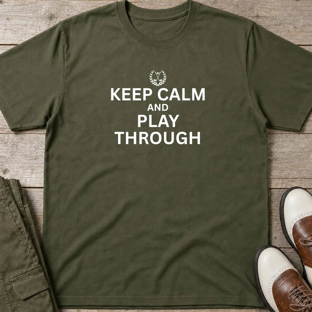 Keep Calm T-Shirt in Military Green lying on a plain floor. T-shirt is a unisex cut and 100 per cent cotton.