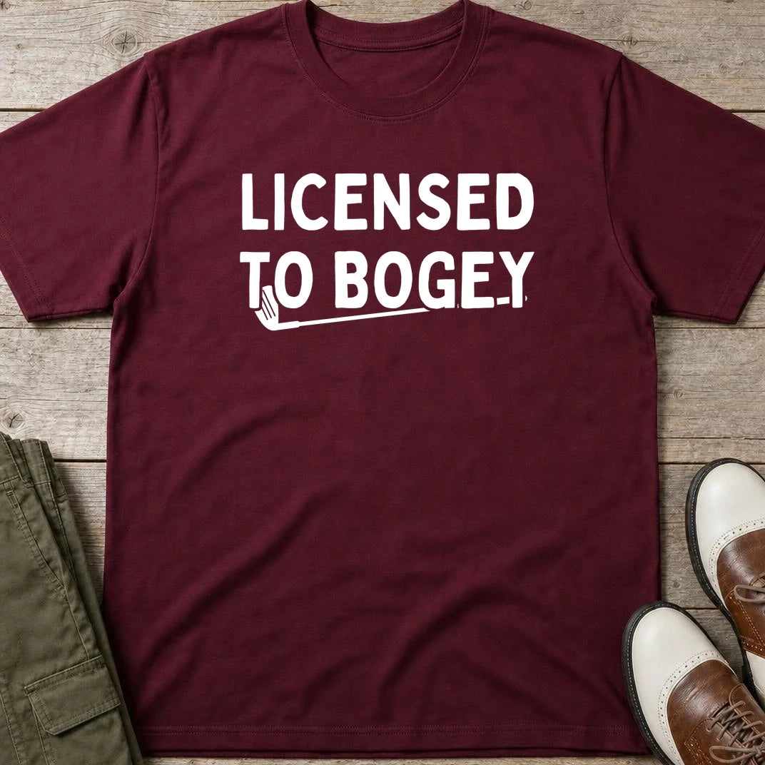 Licensed T-Shirt in Maroon lying on a plain floor. T-shirt is a unisex cut and 100 per cent cotton.