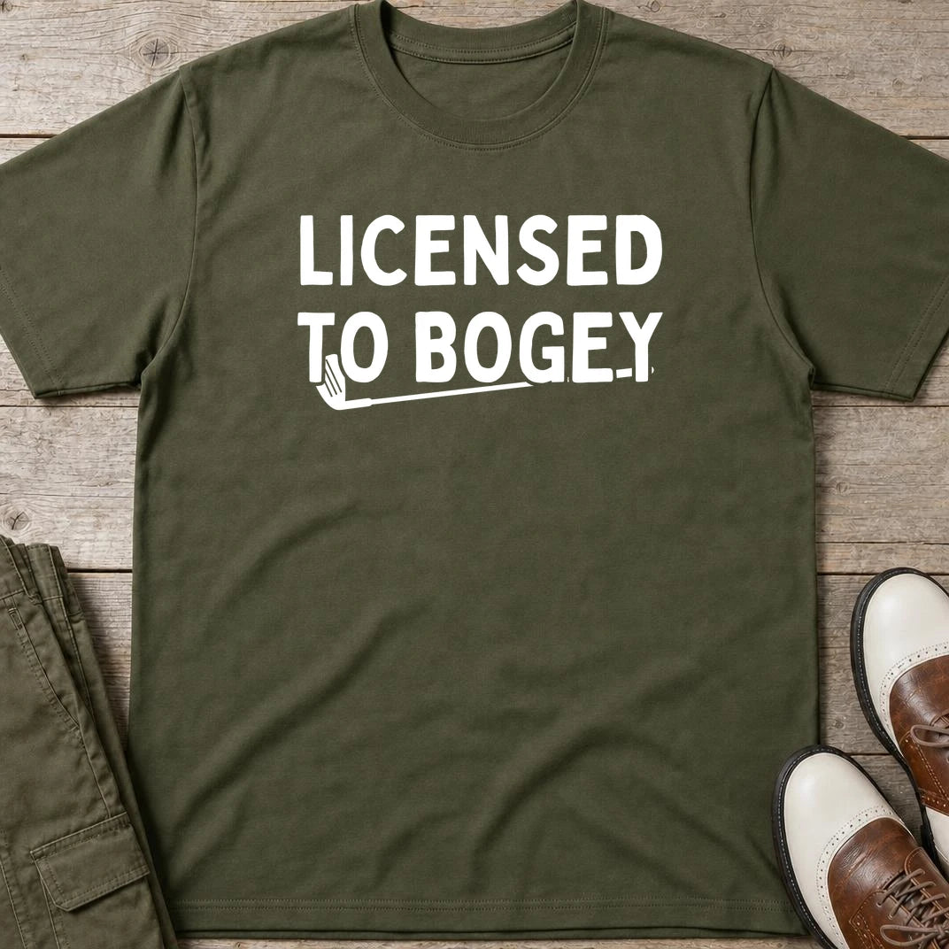 Licensed T-Shirt in Military Green lying on a plain floor. T-shirt is a unisex cut and 100 per cent cotton.