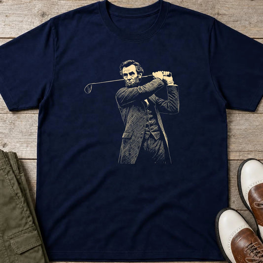 Lincoln On Course T-Shirt in Navy lying on a plain floor. T-shirt is a unisex cut and 100 per cent cotton.