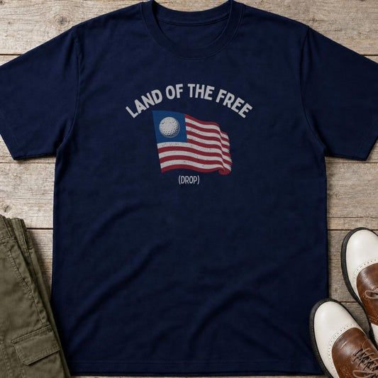 Free Drop T-Shirt in lying on a plain floor. T-shirt is a unisex cut and 100 per cent cotton.