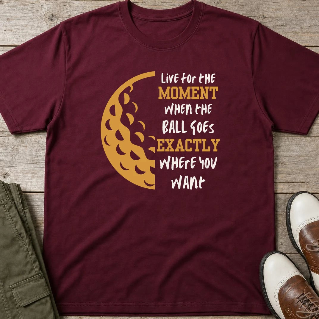 The Moment T-Shirt in Maroon lying on a plain floor. T-shirt is a unisex cut and 100 per cent cotton.