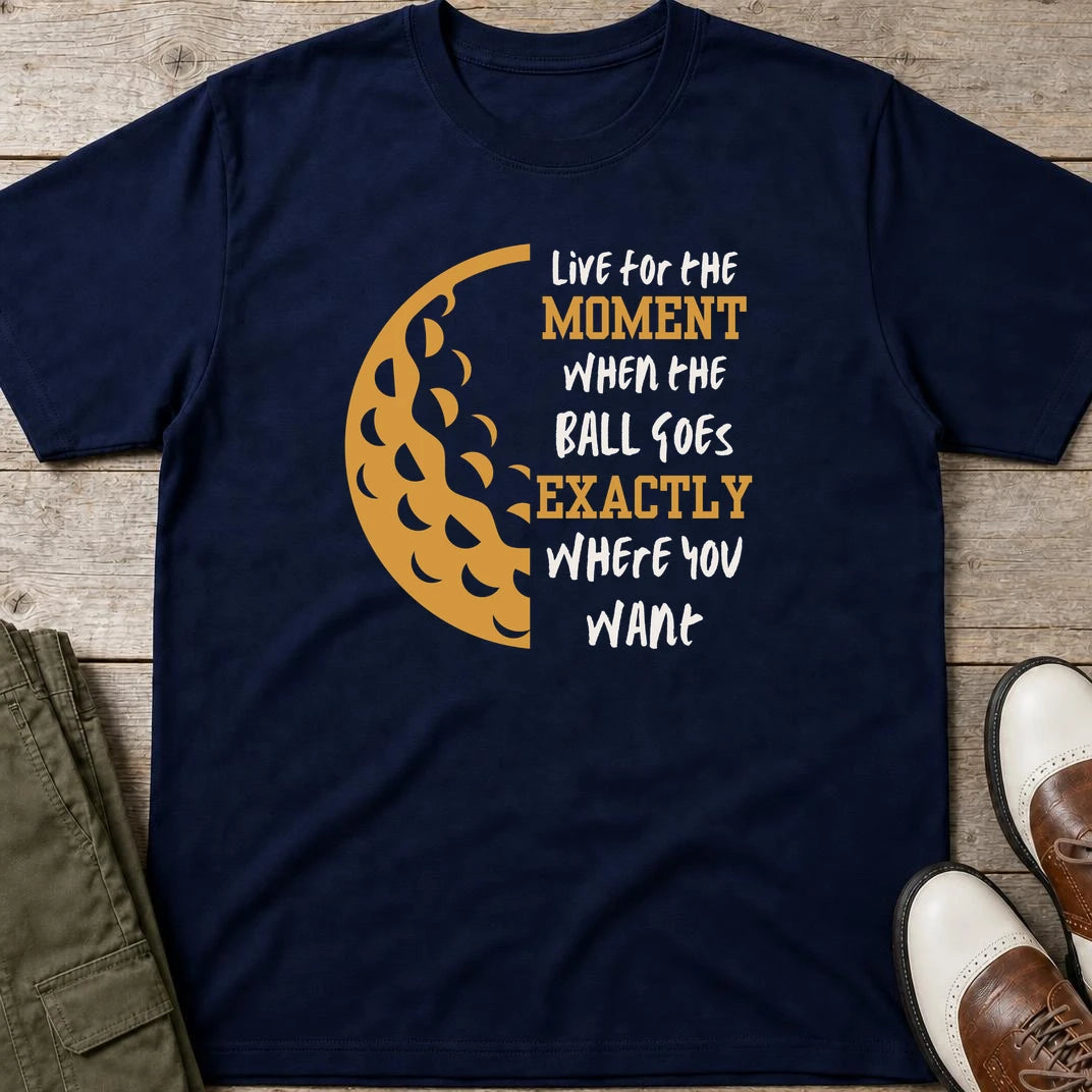 The Moment T-Shirt in Navy lying on a plain floor. T-shirt is a unisex cut and 100 per cent cotton.