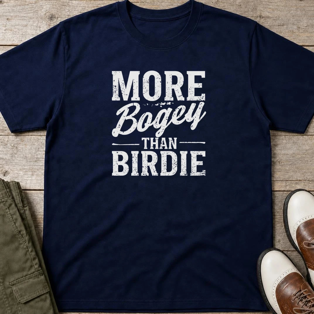 More Bogey T-Shirt in Navy lying on a plain floor. T-shirt is a unisex cut and 100 per cent cotton.