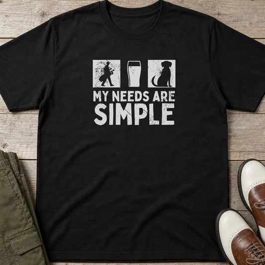 Simple T-Shirt in Black lying on a plain floor. T-shirt is a unisex cut and 100 per cent cotton.