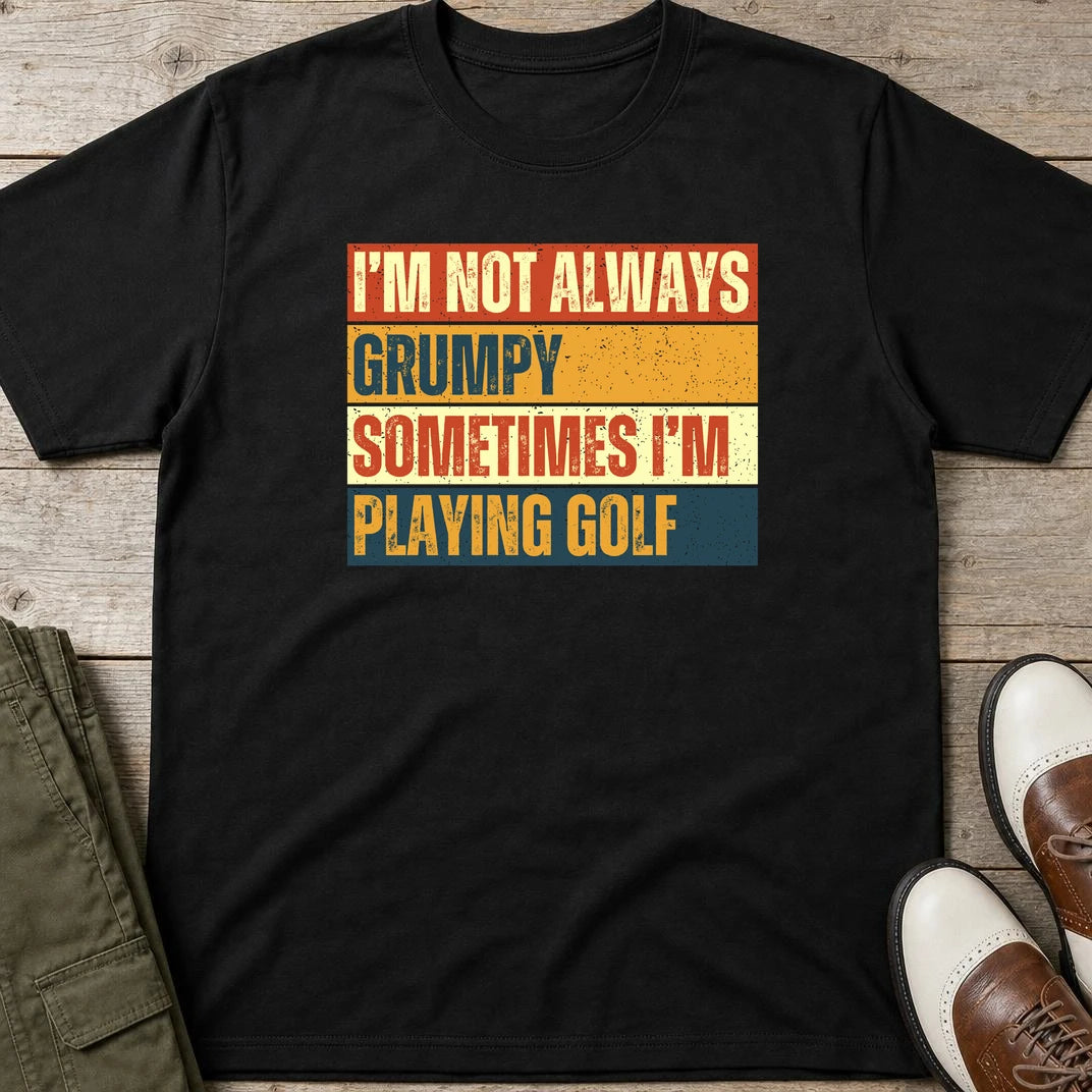 Grumpy Vintage T-Shirt in Black lying on a plain floor. T-shirt is a unisex cut and 100 per cent cotton.