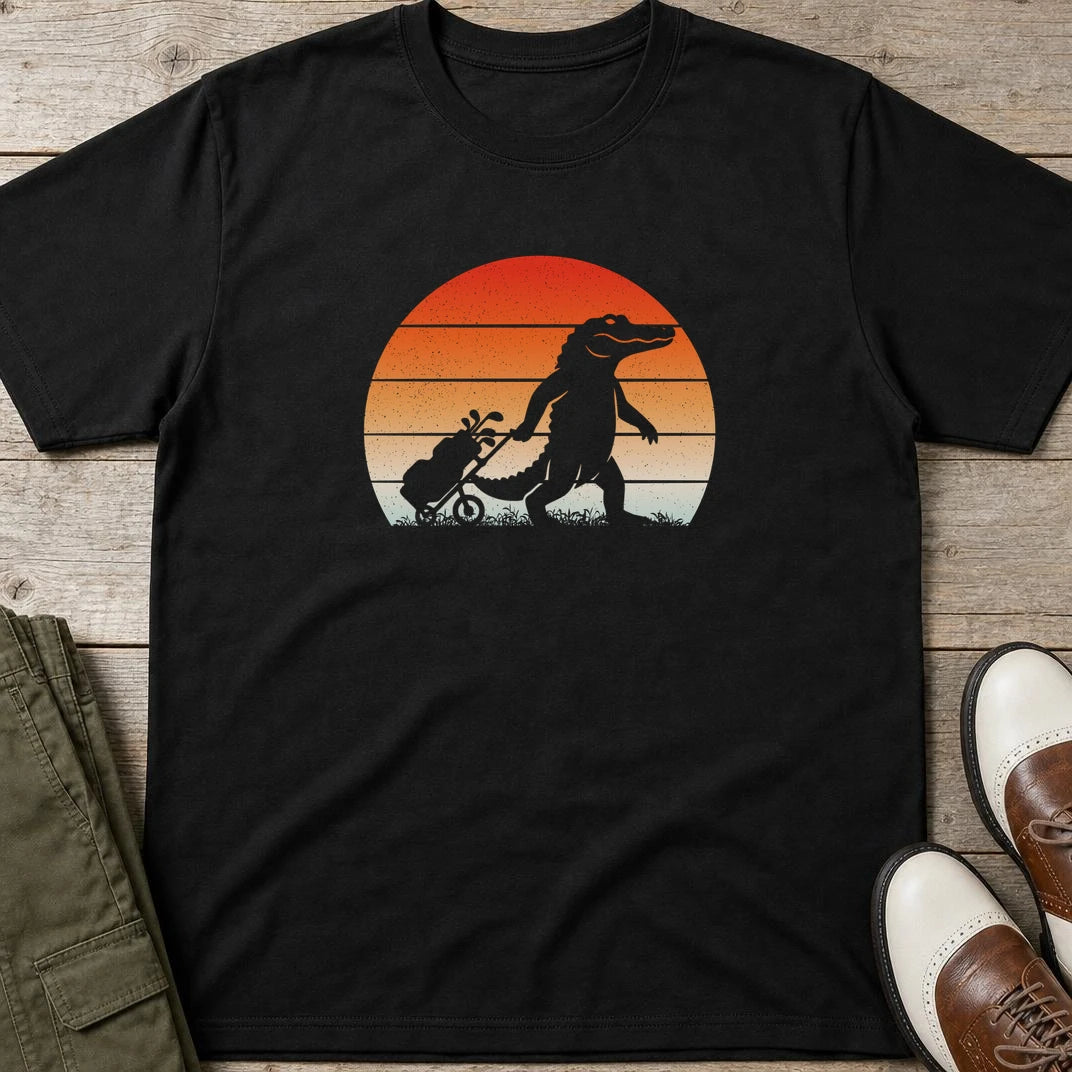 Trolley Gator T-Shirt in Black lying on a plain floor. T-shirt is a unisex cut and 100 per cent cotton.