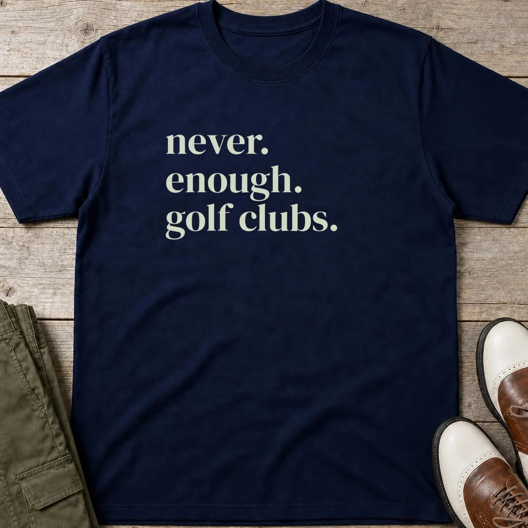 Never Enough T-Shirt in Navy lying on a plain floor. T-shirt is a unisex cut and 100 per cent cotton.