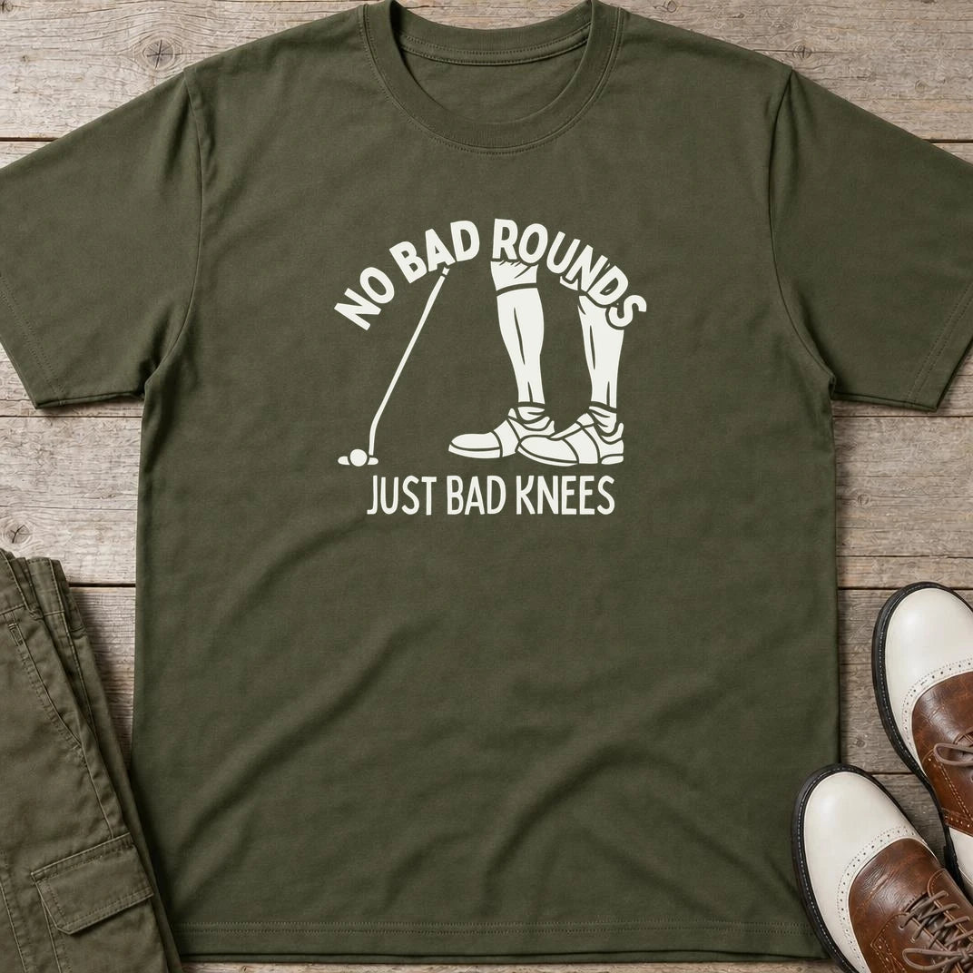 No Bad Rounds T-Shirt in Military Green lying on a plain floor. T-shirt is a unisex cut and 100 per cent cotton.