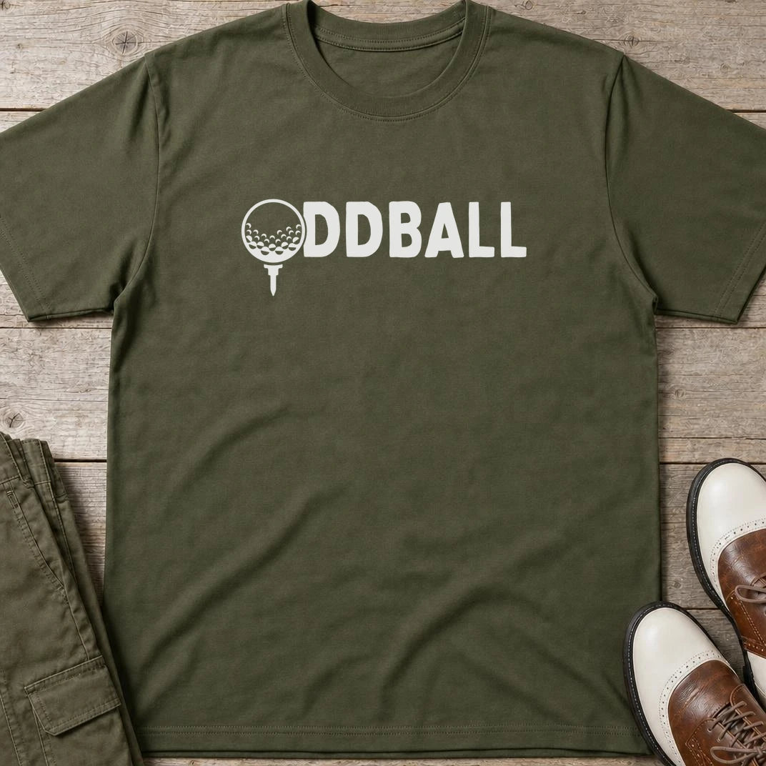 Oddball T-Shirt in Military Green lying on a plain floor. T-shirt is a unisex cut and 100 per cent cotton.