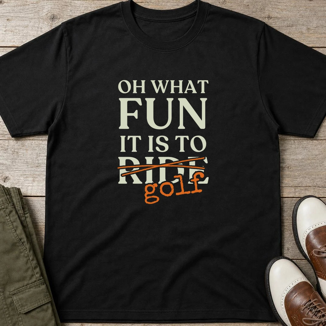 Oh What Fun T-Shirt in Black lying on a plain floor. T-shirt is a unisex cut and 100 per cent cotton.